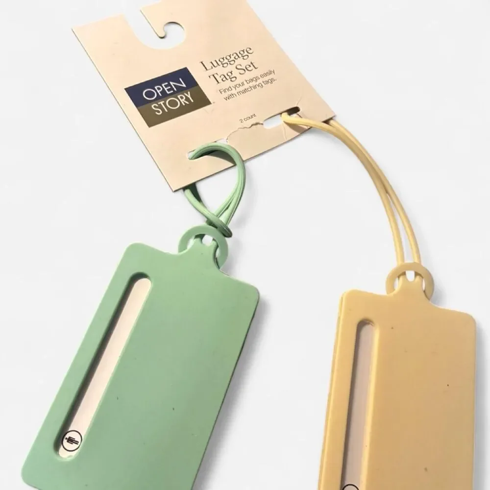 Two NWT Luggage Tags